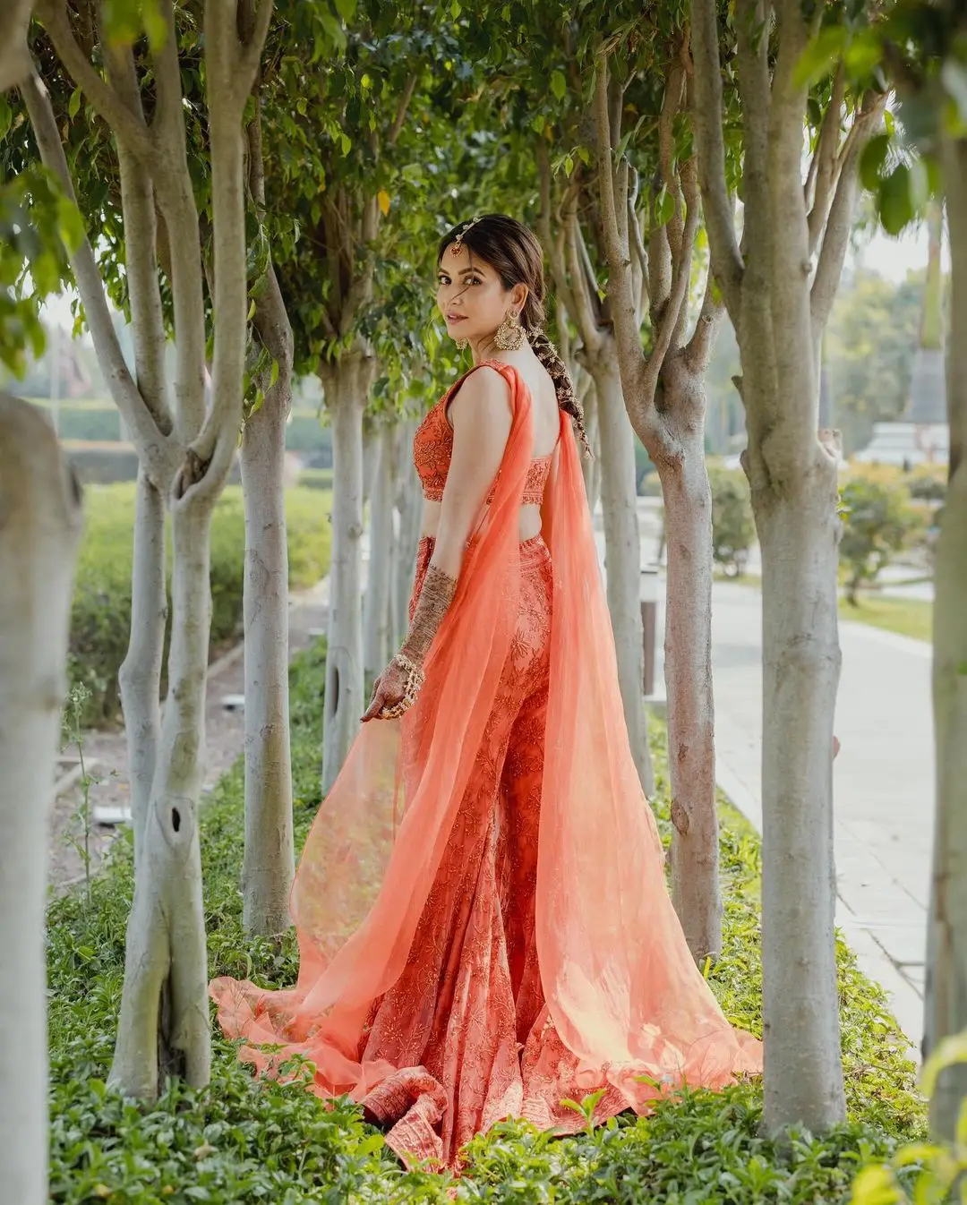 KRITI KHARBANDA IMAGES IN TRADITIONAL ORANGE LEHENGA CHOLI 6